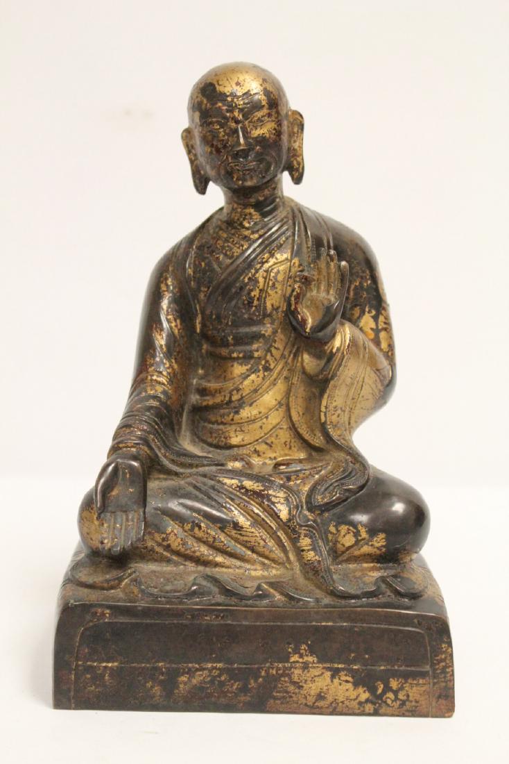 Chinese gilt bronze sculpture of seated monk (1 of 10)