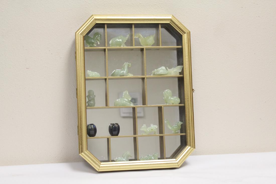 wall hanging curio cabinet w/ miniature carvings (1 of 10)