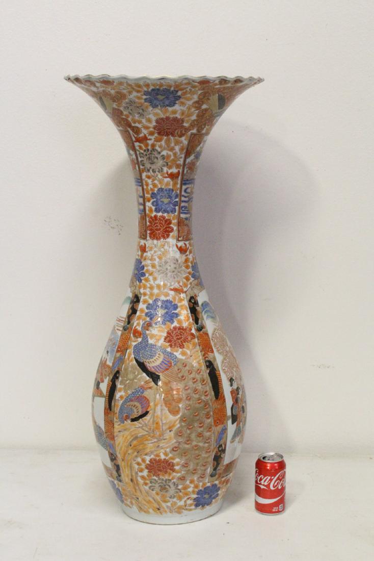 Antique Japanese kutani vase: Antique Japanese kutani vase, panel painted with samurai court scenes, accented by peacock, koi fish, signed by artist, top rim repair and bottom drilled, 36.5"Hx16"dia
