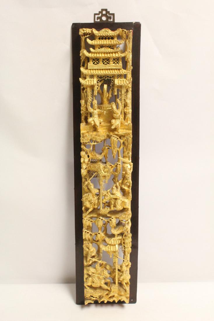 An elaborate Chinese gilt wood carved wall panel (1 of 9)