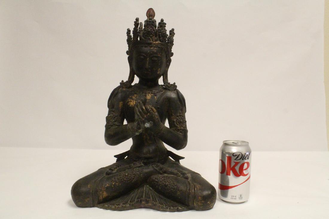 A large bronze sculpture of seated Buddha (1 of 10)