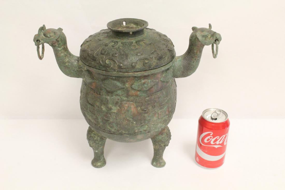 Chinese archaic style bronze handled 3 feet ding (1 of 10)