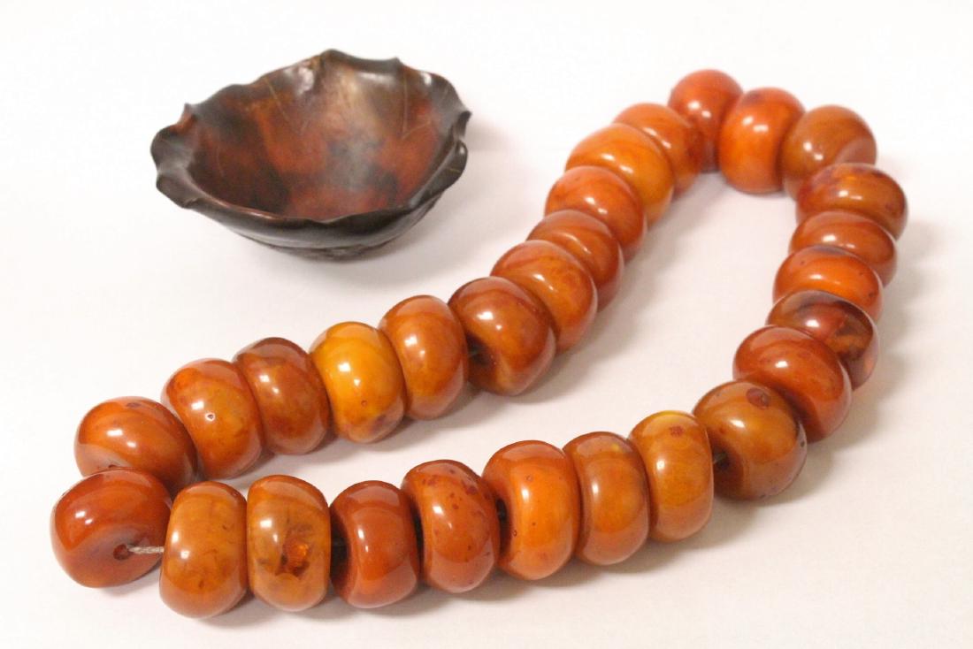 Amber like necklace and horn like bowl (1 of 10)