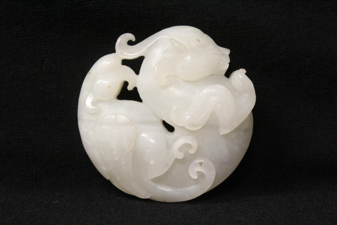 A beautiful Chinese white jade carved mystic animal (1 of 8)