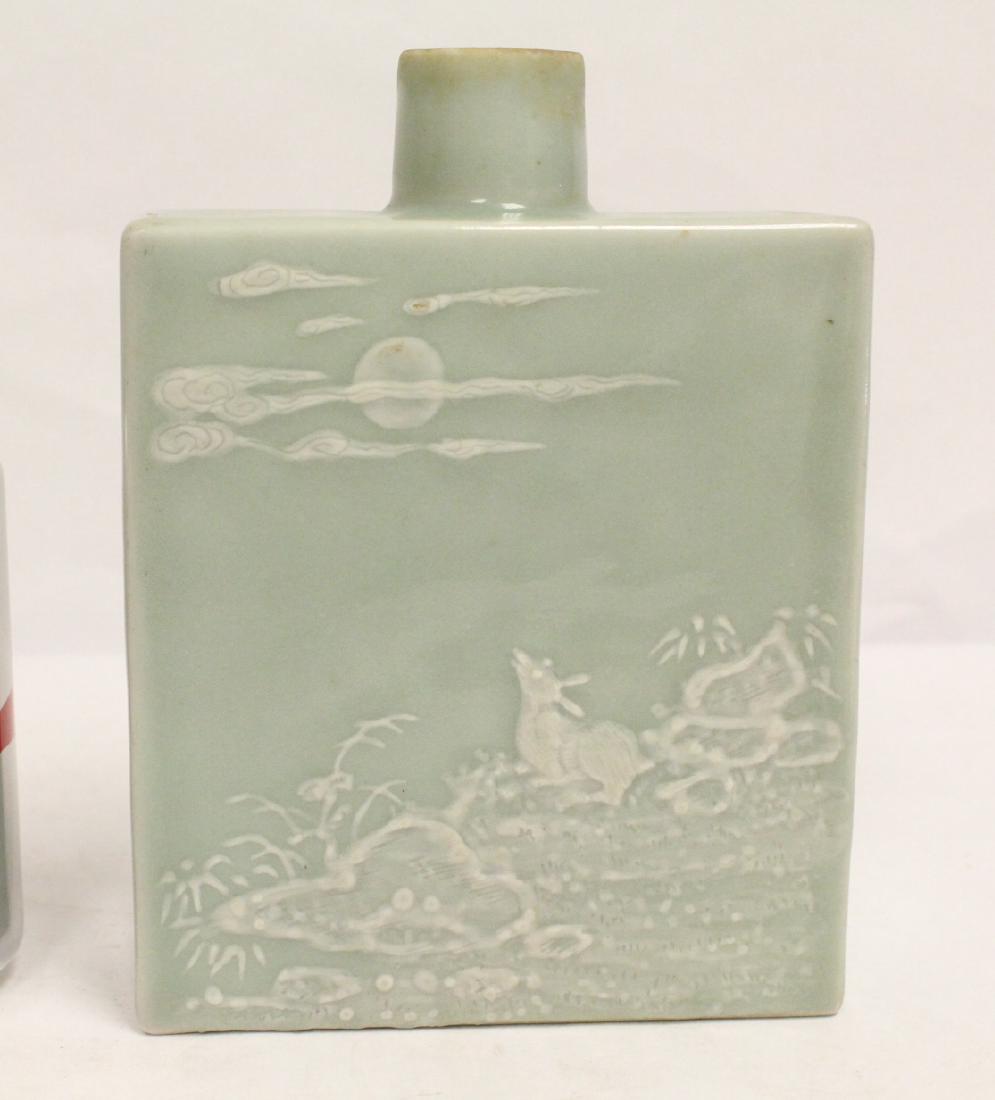 sky blue glazed porcelain wine flask, Qianlong mark: A fine sky blue glazed porcelain wine flask, Qianlong mark (one side panel has hairline), 7.35"Hx5.5"x2"