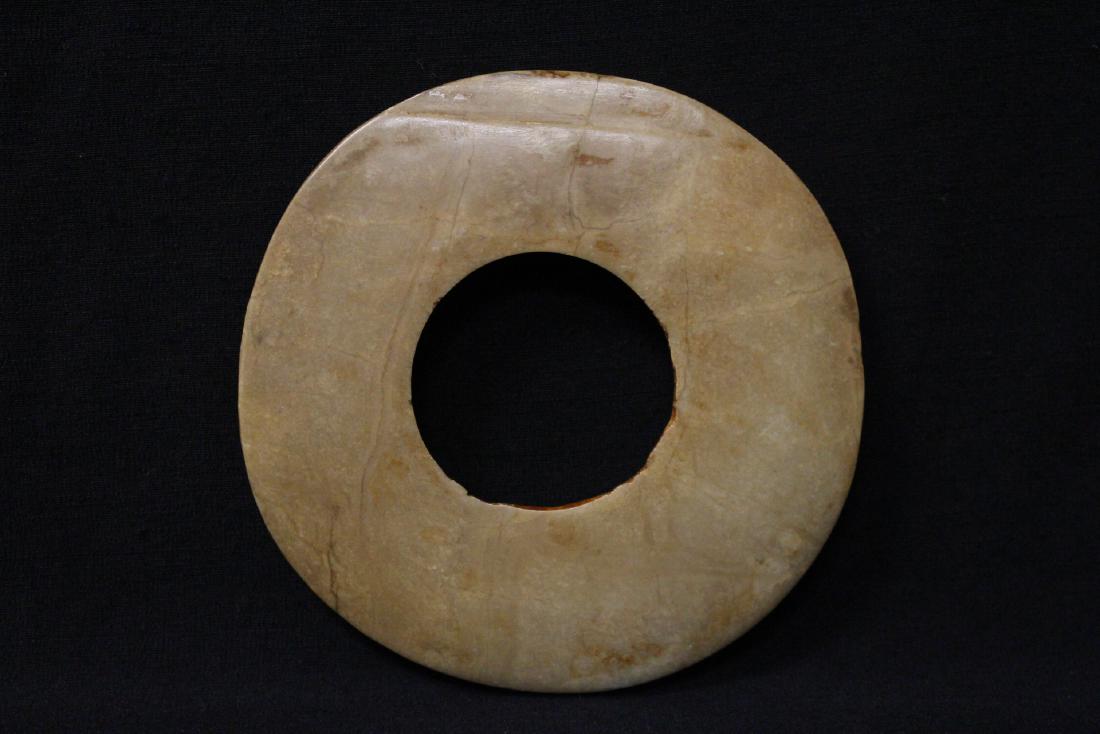 Chinese archaic style light celadon jade carved disc (1 of 10)