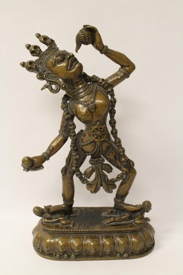 A fine Tibetan bronze sculpture of deity (1 of 9)