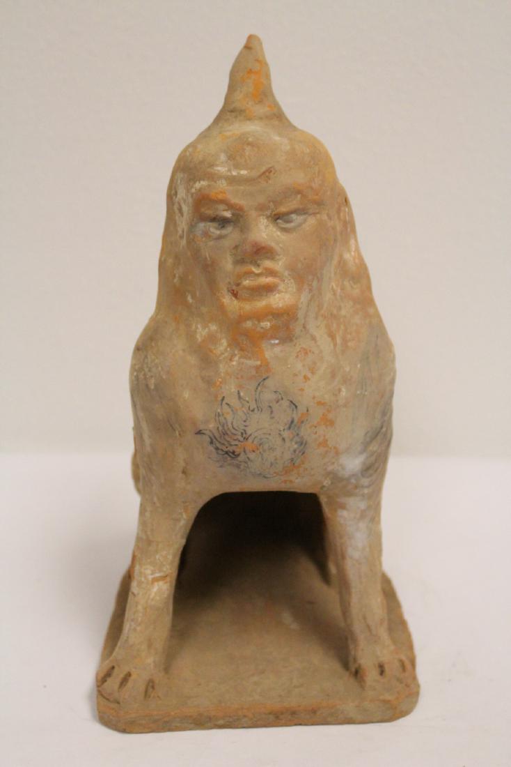 A rare possible Han pottery sculpture: A rare possible Han pottery sculpture of beast with human face, 11.1"H