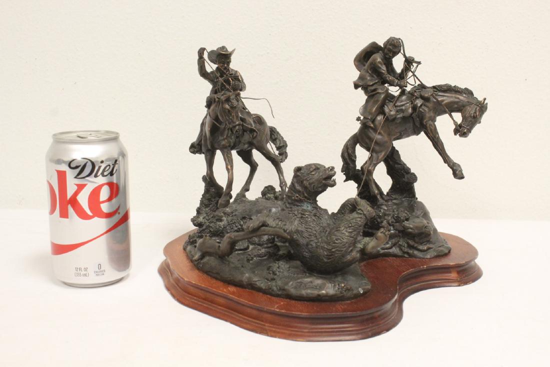 bronze sculpture depicting bear hunters (1 of 10)