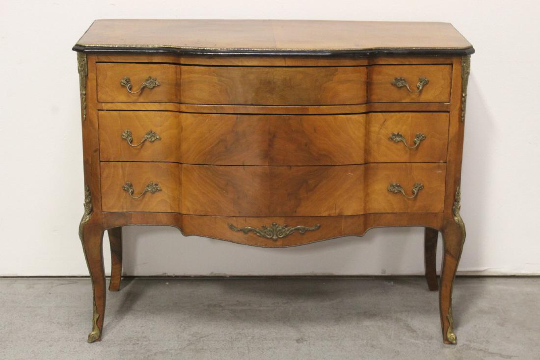 A French 19th/20th c. fruit wood chest of drawers: A French 19th/20th century fruit wood chest of drawers with bronze ormolu, 32.25"Hx40.1"x16.2"