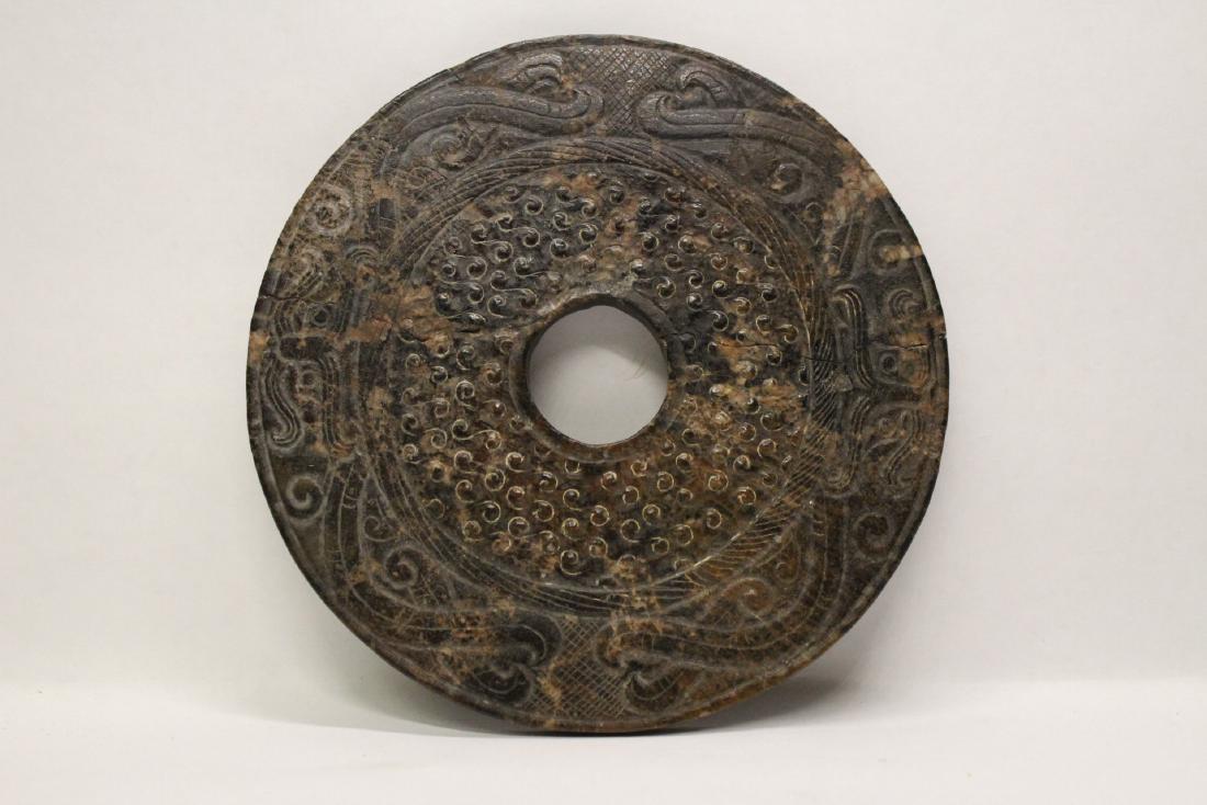 An important Chinese antique jade carved disc (1 of 10)