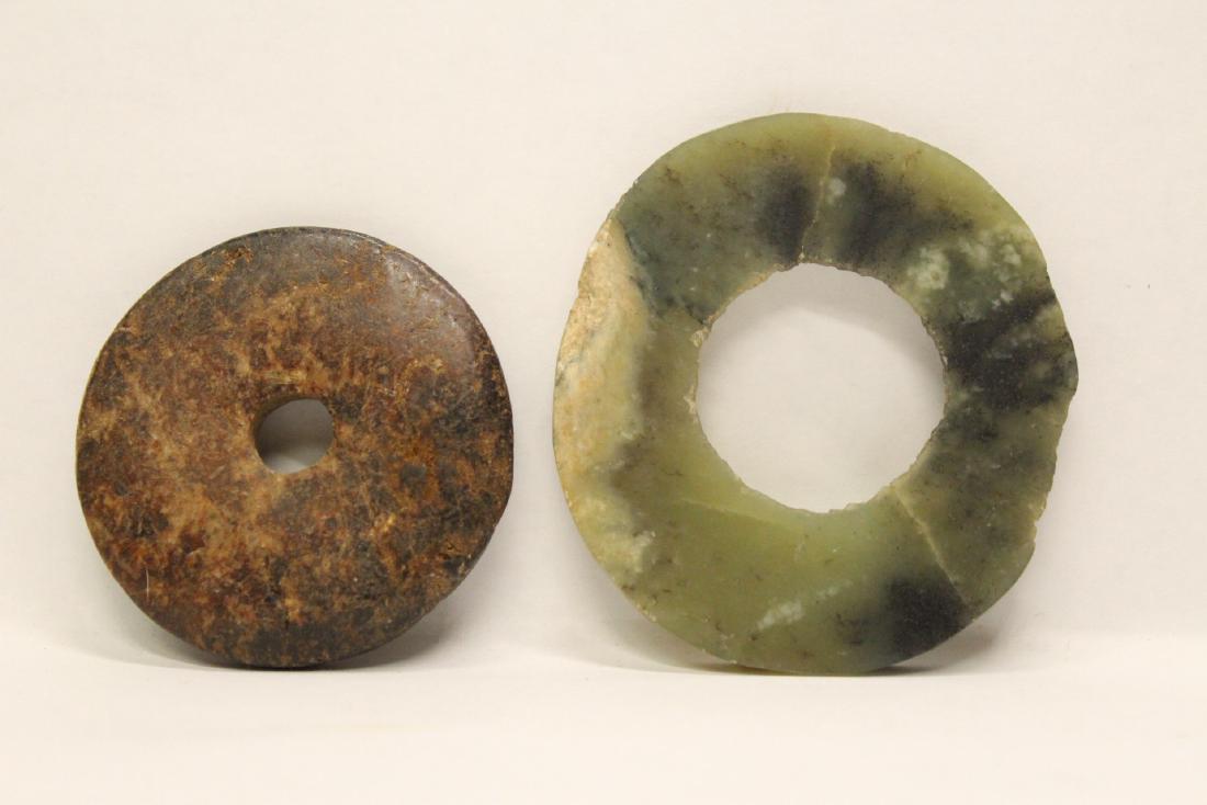 2 archaic jade like stone disc (1 of 9)