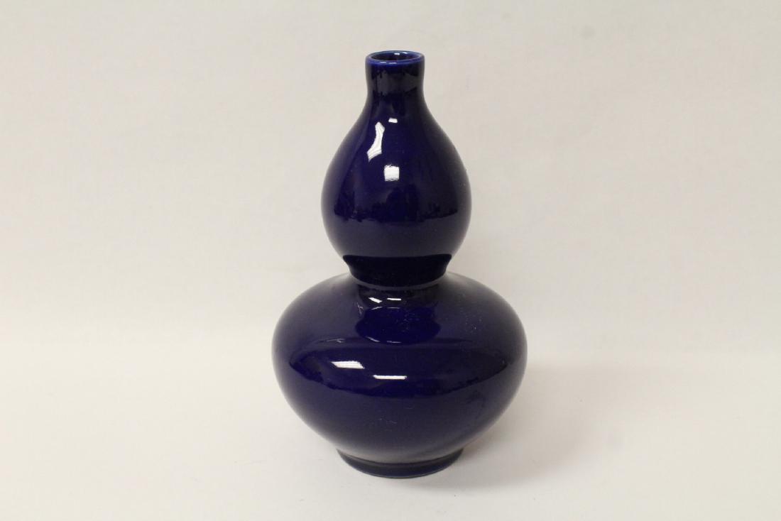 Blue glazed gourd shape vase (1 of 9)