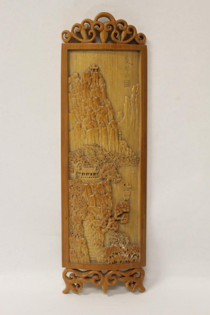 A very elaborately carved Chinese bamboo armrest (1 of 10)
