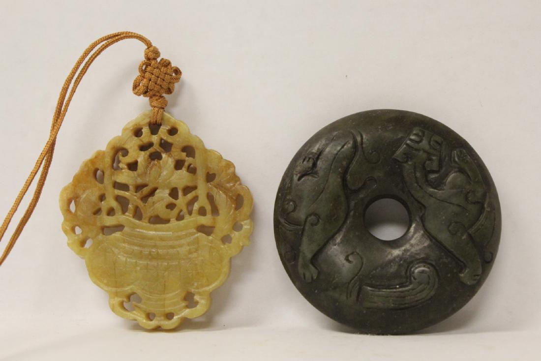 Chinese white jade plaque and a Chinese green jade disc: Chinese white jade plaque (2.13"x2.45"x0.25") in flower vase motif and a Chinese green jade disc (0.55"x2.4"dia)