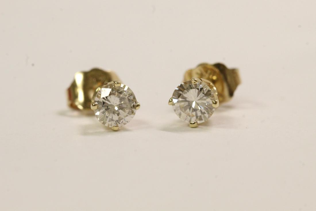 Pair 14K Y/G diamond stud earrings (1 of 9)