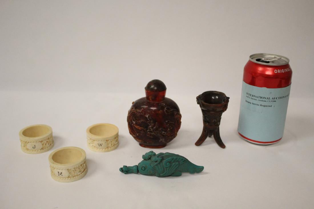 6 items: 3 bone carved napkin rings (0.95"x1.8"dia each), horn carved cup (2.9"H), an amber like snuff bottle (3.8"H), and a turquoise like stone snuff bottle (4.1"H)