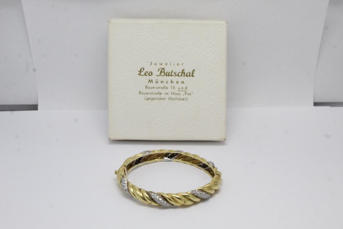 A beautiful 18K Y/G diamond bangle bracelet (1 of 10)