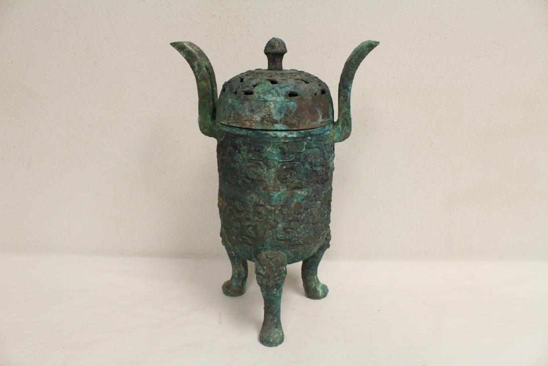 Chinese archaic style bronze tripod censer: Chinese archaic style bronze tripod censer, 14.6"Hx9.7"x6.5"