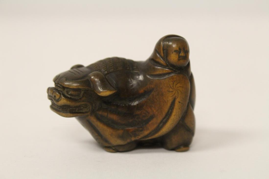 Japanese 19th c. wood carved netsuke, signed