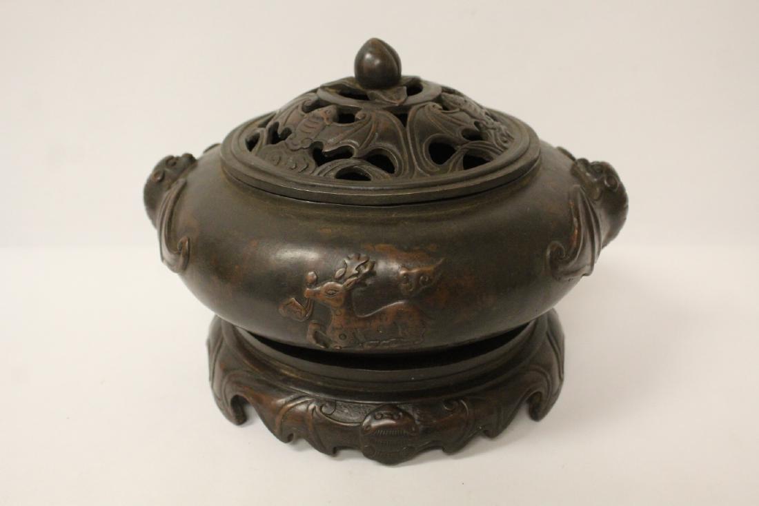 A large Chinese bronze covered censer with stand (1 of 11)