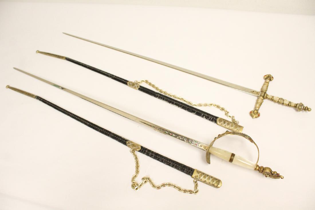 2 swords with leather scabbard (1 of 10)