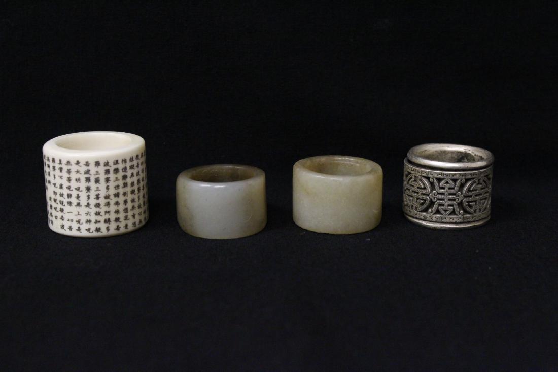 4 archer rings; including 2 jade carved example (1 of 10)