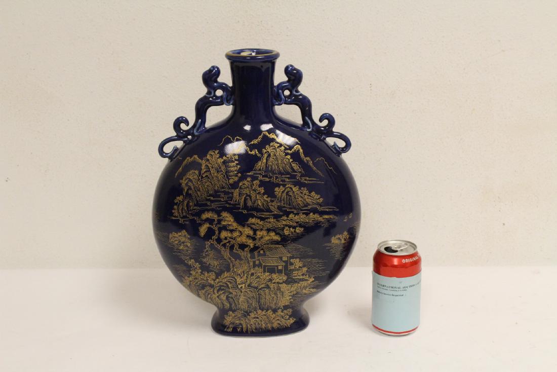 Chinese blue background flask: Chinese blue background flask, gold painted with landscape, 15.25"Hx11.2"x4.75"