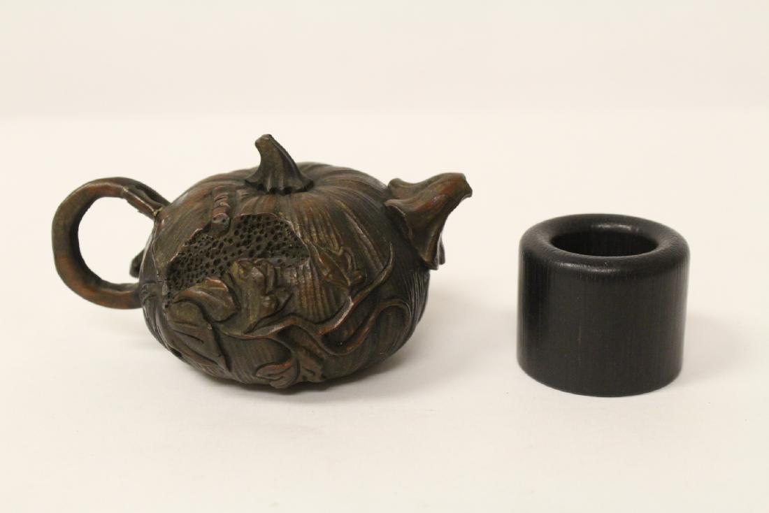 Bamboo archer's ring and a possible wood carving (1 of 10)