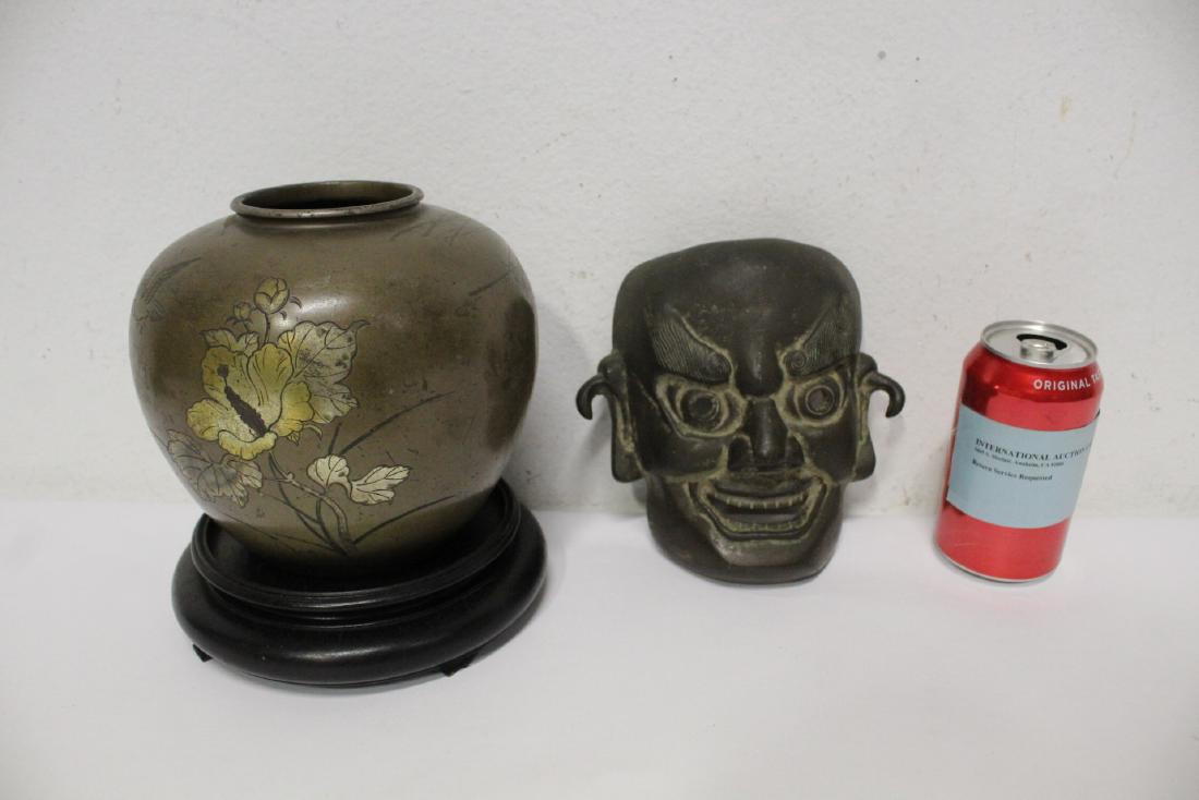 Japanese inlaid bronze jar and a bronze kabuki mask (1 of 10)