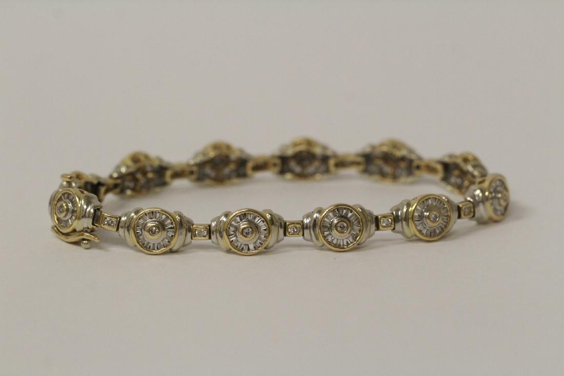 A heavy 14K Y/G diamond bracelet (1 of 11)