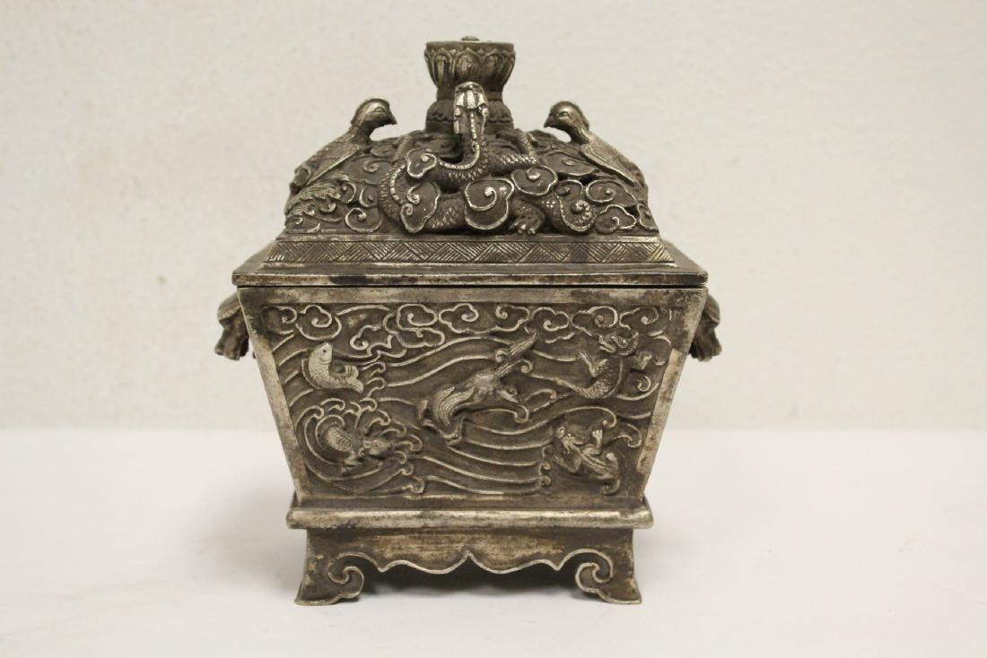 An ornate silver on bronze covered censer (1 of 11)