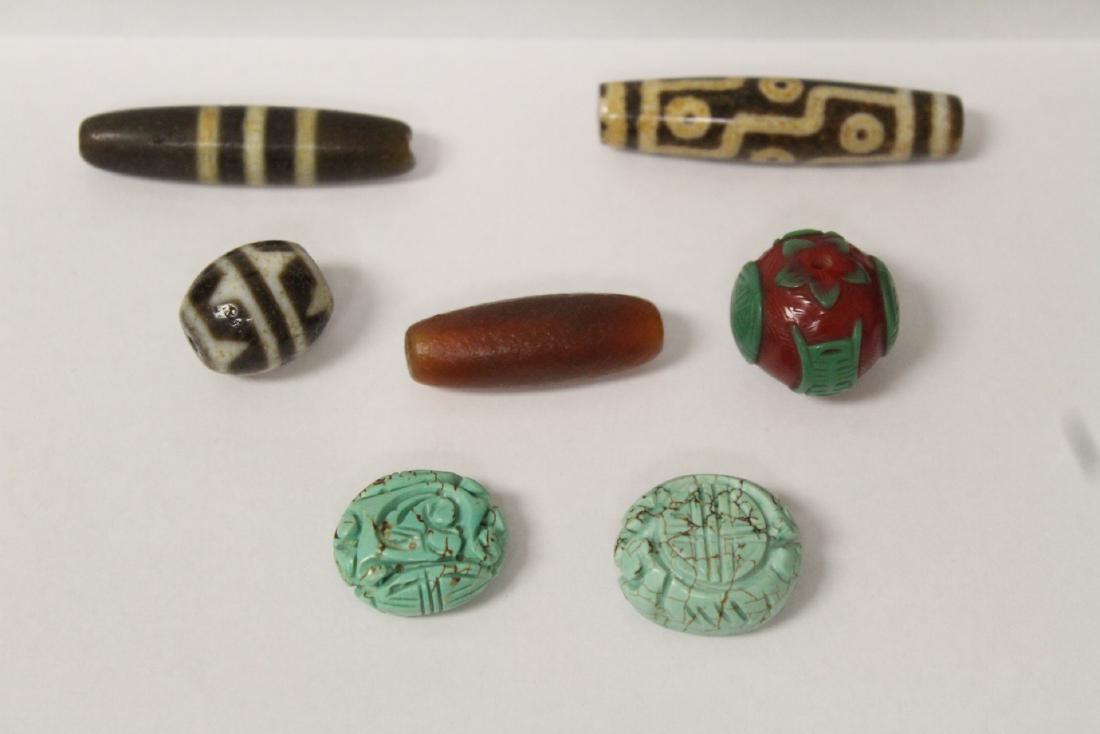 7 misc. beads; including 3 dzi beads (1 of 9)