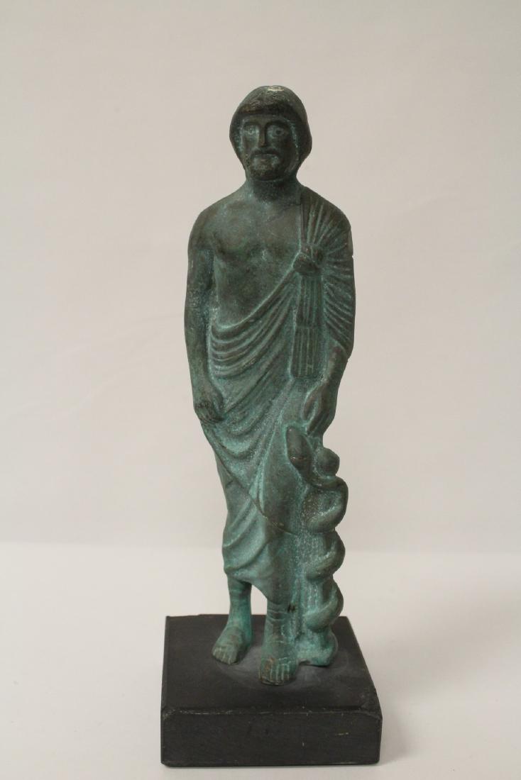 A very heavy solid bronze figure (1 of 10)