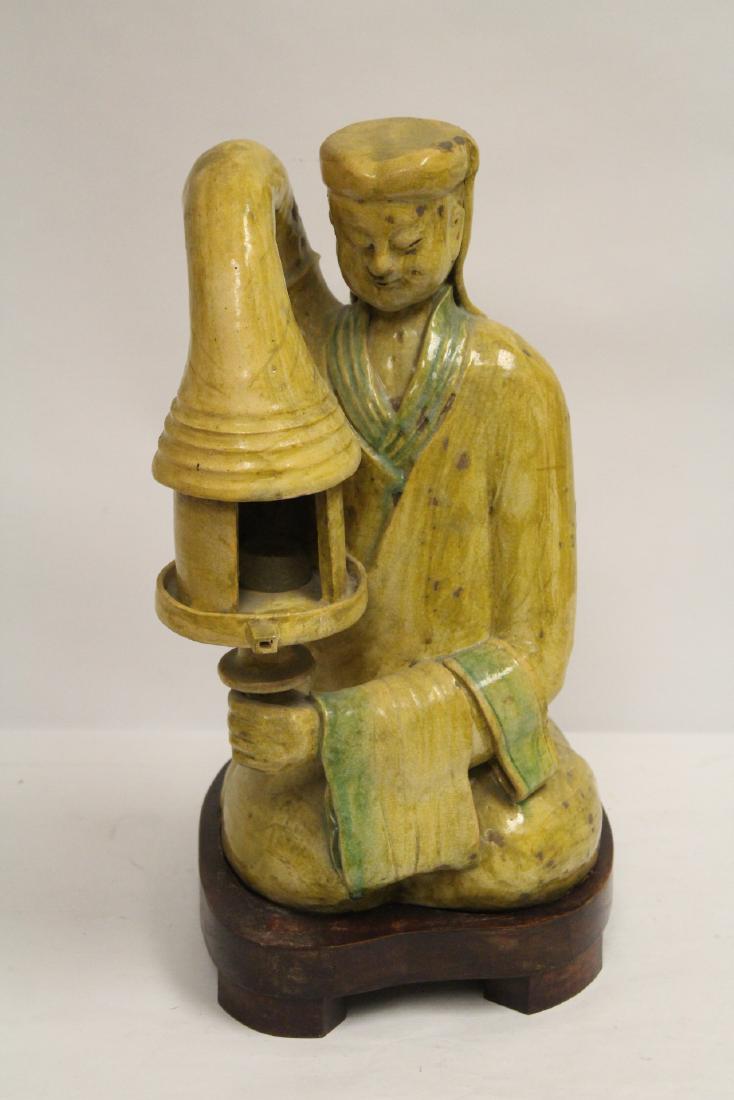 Chinese Han style pottery lamp in figure motif (1 of 11)