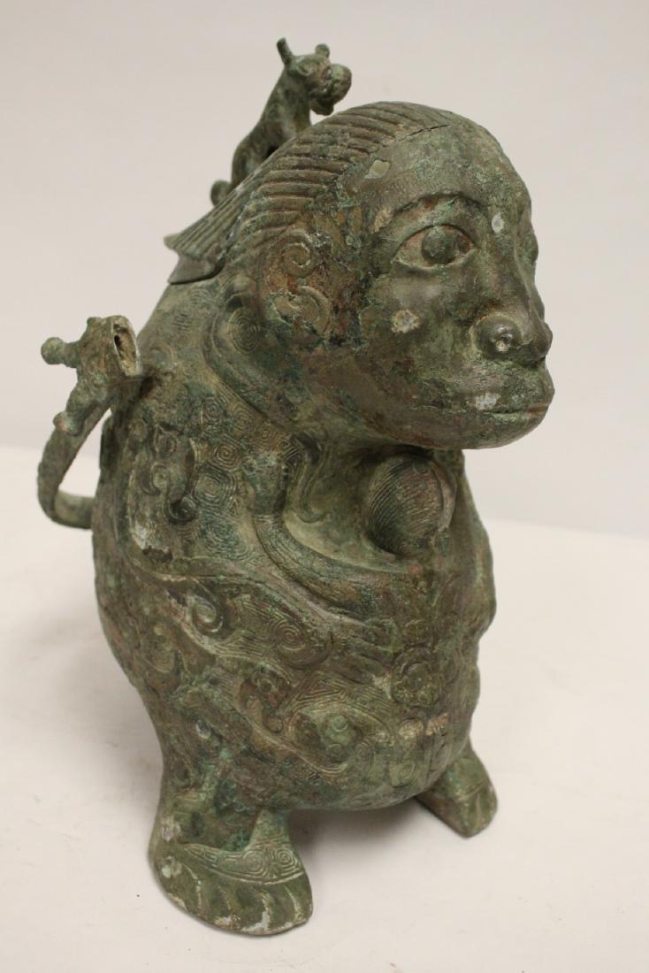 Chinese archaic style bronze wine server: Chinese archaic style bronze wine server in the form of monkey(?), 13.75"Hx7.8"x8"