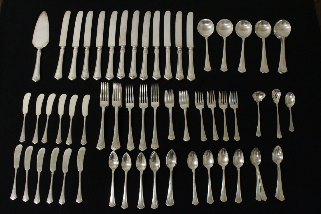 A large serving for 12 Wallace sterling dinner set: A large serving for 12 Wallace sterling dinner set in carmel pattern; including 12 dinner knives, 12 dinner forks, 12 soap spoons, 12 salad forks, 12 tea spoons, 12 ice cream spoons, a soap ladle, a b