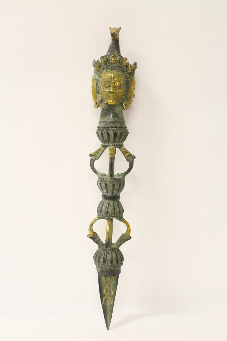 A parcel gilt Tibetan religious instrument (1 of 11)