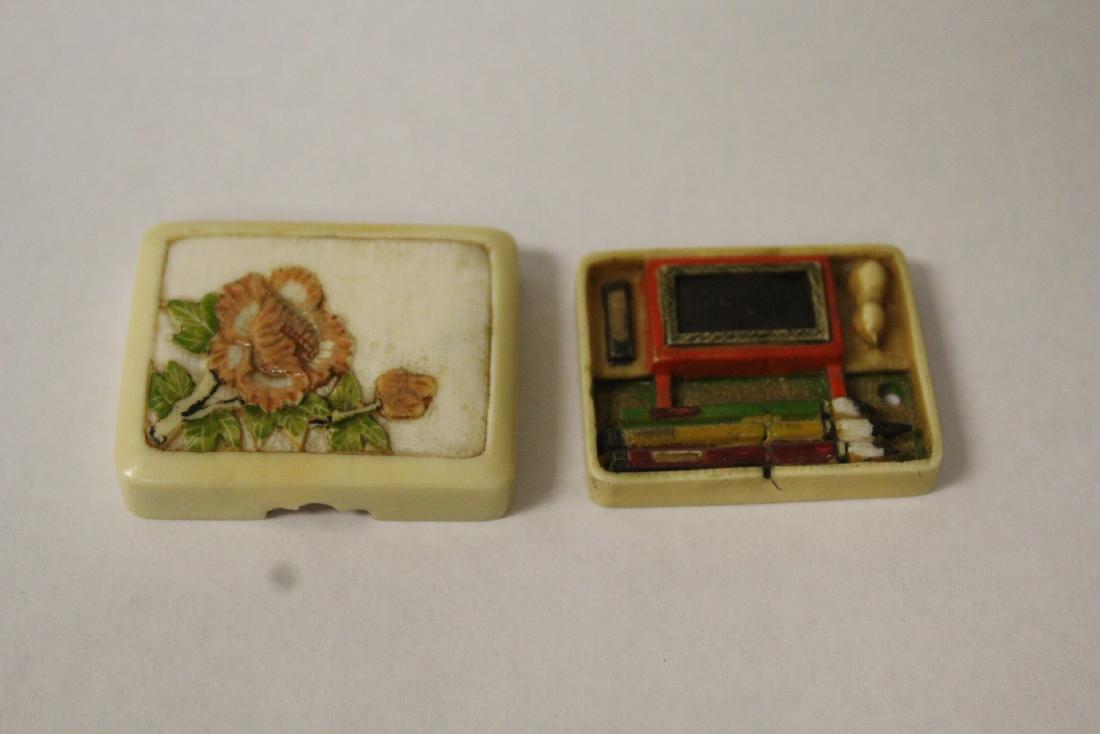 antique Japanese bone carved box w/ contents: A beautiful antique Japanese bone carved box (1.7"x1.4"x0.45"), open to reveal artist brush set, ink stone and ink stick