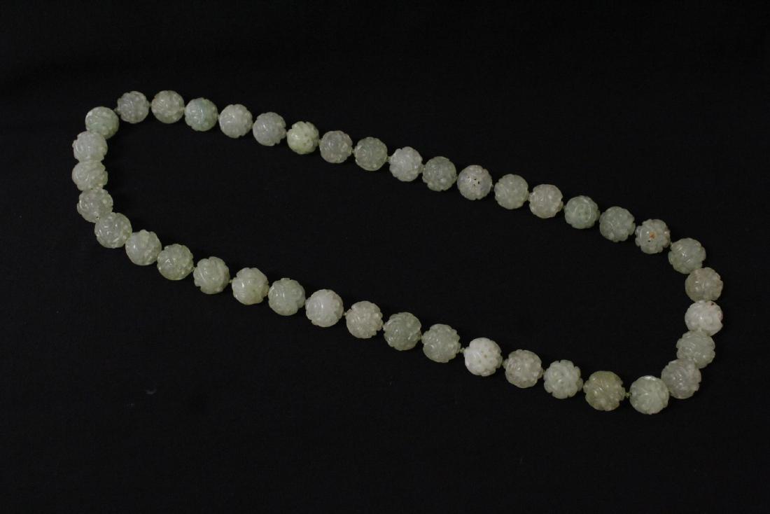 An elaborate and well carved jade bead necklace (1 of 10)
