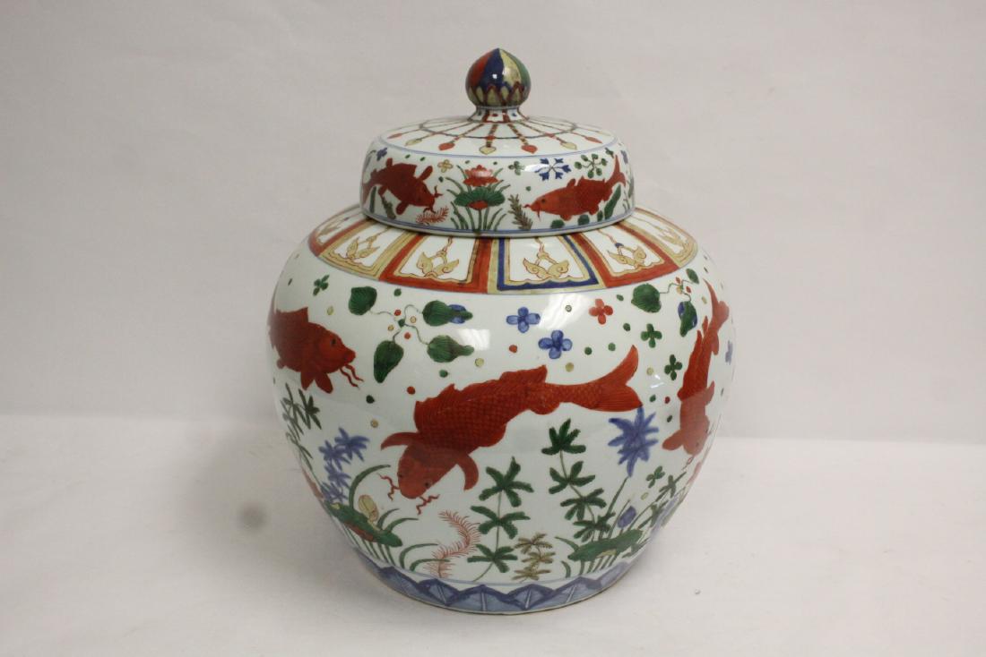 A massive Chinese wucai porcelain covered jar (1 of 9)