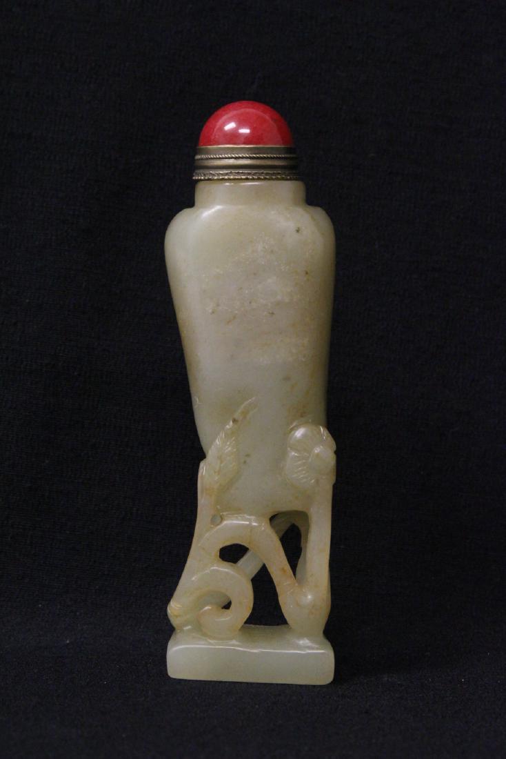 A fine grey jade carved snuff bottle (1 of 9)