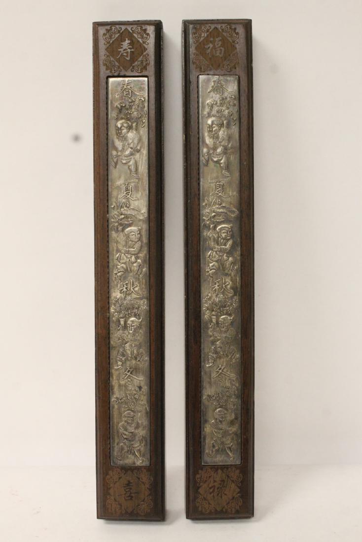 Pair rosewood paper weight with silver like plaque (1 of 10)