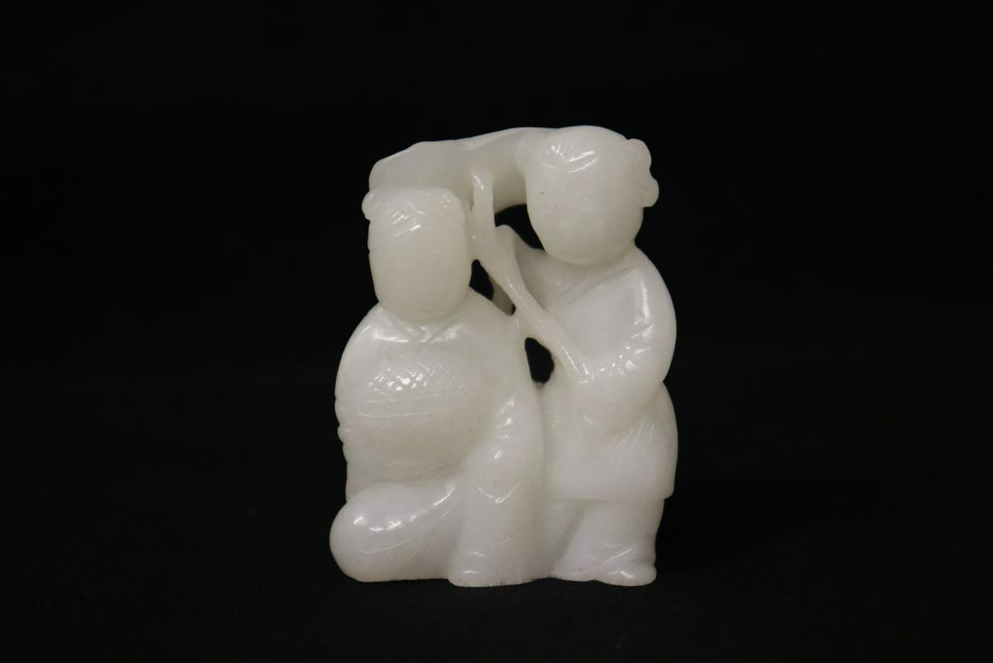 A fine white jade carved figure (1 of 9)