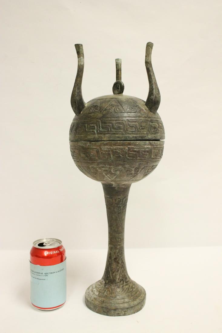 A large Chinese archaic style bronze dou: A large Chinese archaic style bronze dou, 18.9"Hx6.75"dia