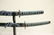 2 contemporary samurai swords on stand - 2