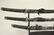 3 contemporary samurai swords on stand - 2