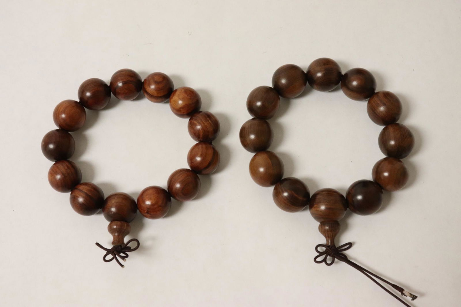 2 possible chenxiang wood bead bracelets (1 of 9)