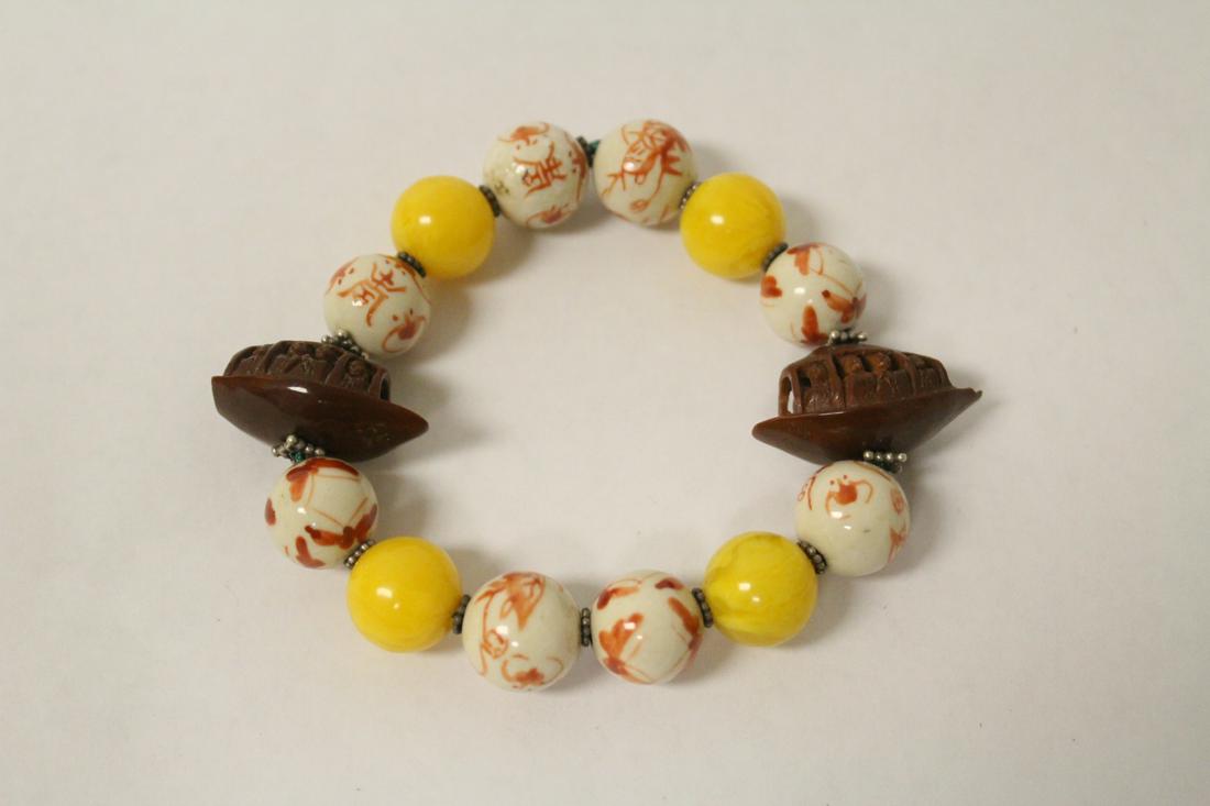 Chinese porcelain, nut and amber bead bracelet (1 of 9)