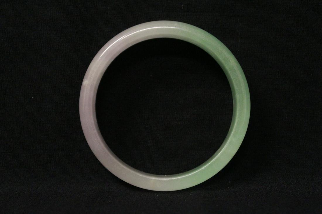 A jadeite like bangle: A jadeite like bangle, 0.5"x3"od(2.45"id)
